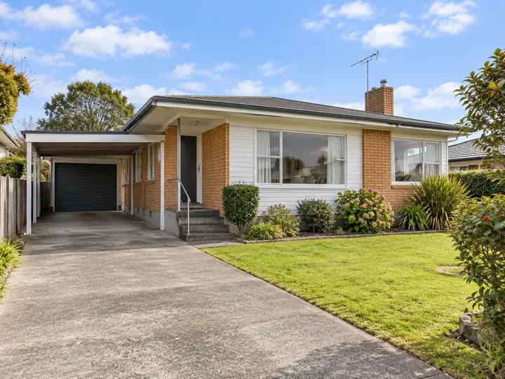 Brick home with carport